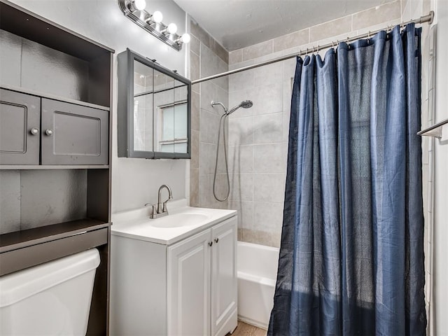 full bathroom featuring vanity, shower / bathtub combination with curtain, and toilet