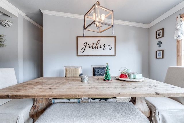 dining space with an inviting chandelier and ornamental molding