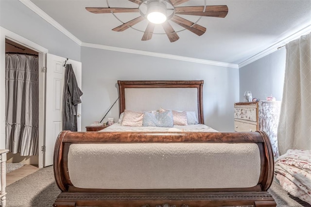 bedroom with ceiling fan, ornamental molding, and vaulted ceiling