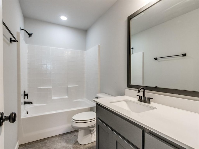 full bathroom featuring toilet, recessed lighting, washtub / shower combination, and vanity