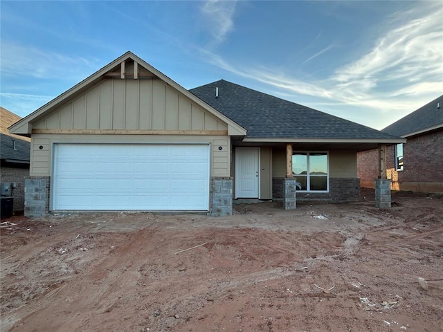 craftsman inspired home with a garage