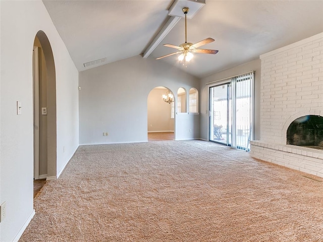 unfurnished living room featuring vaulted ceiling with beams, carpet floors, a brick fireplace, and ceiling fan