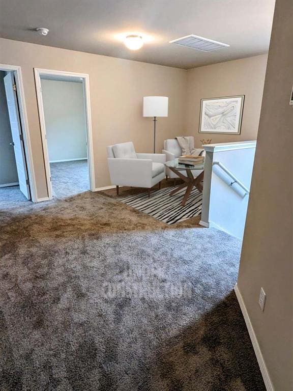 living area with carpet