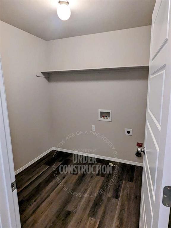 washroom featuring washer hookup, dark hardwood / wood-style floors, and electric dryer hookup