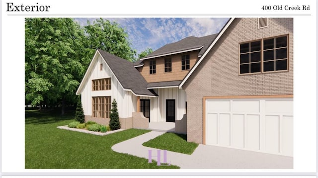 view of front of home with a garage and a front lawn