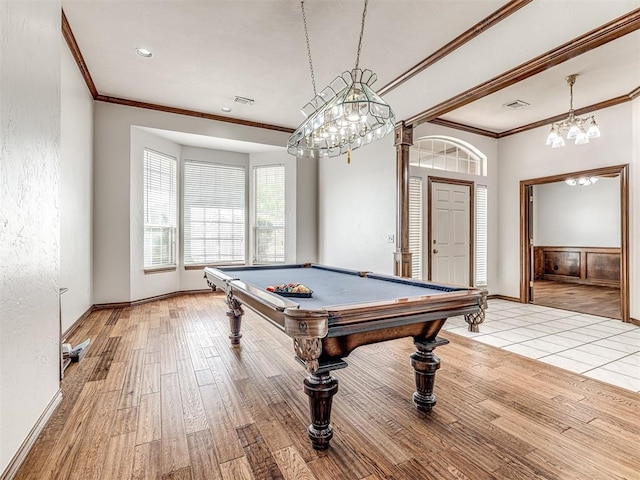 recreation room with light hardwood / wood-style flooring, ornamental molding, and pool table