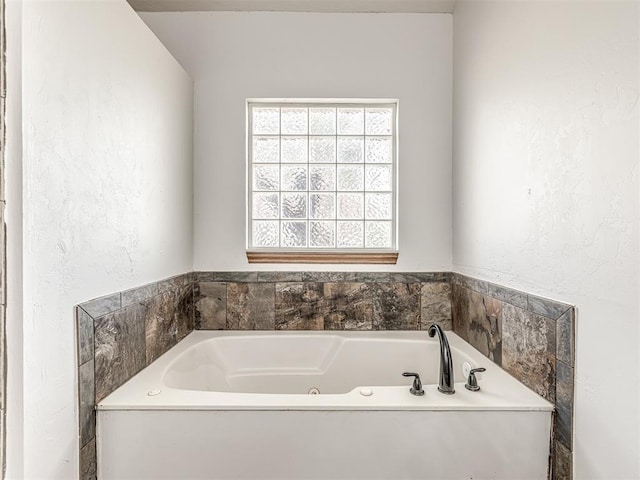 bathroom with a bathing tub