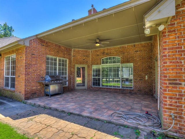 view of patio featuring ceiling fan and grilling area