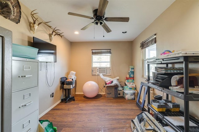 workout room with cooling unit, dark wood-type flooring, and ceiling fan