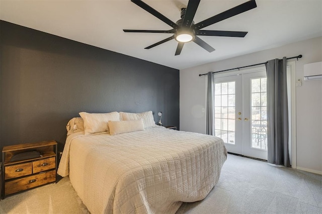 carpeted bedroom with ceiling fan, access to exterior, an AC wall unit, and french doors