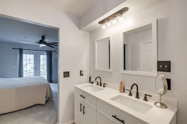 bathroom featuring french doors, vanity, and ceiling fan