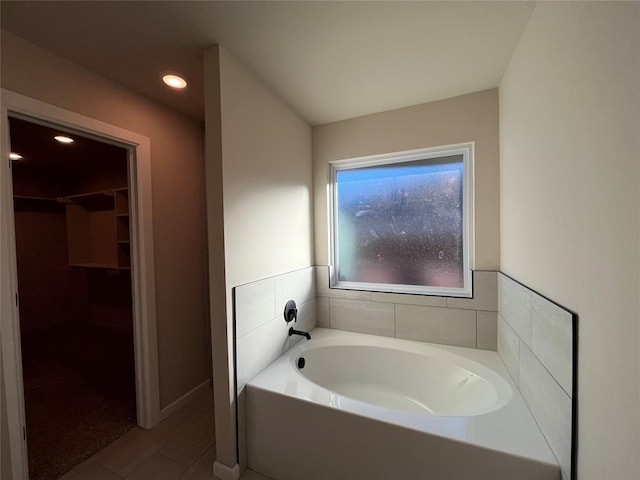 bathroom with a washtub