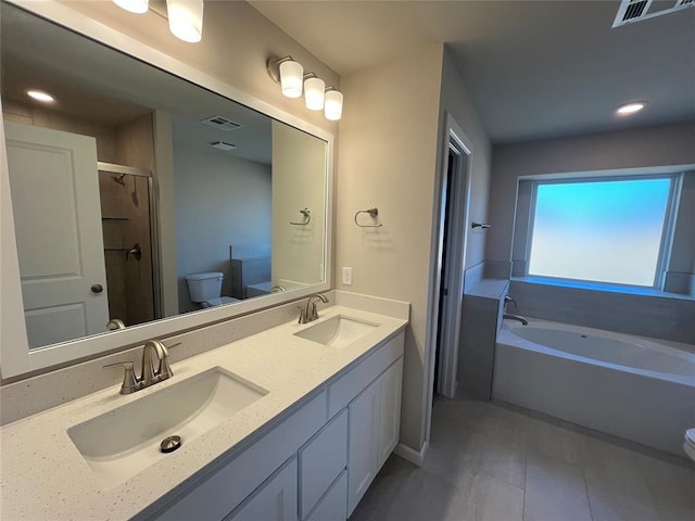 full bath featuring toilet, visible vents, and a sink