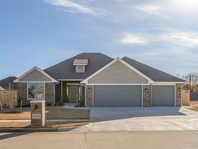 view of front of property with a garage