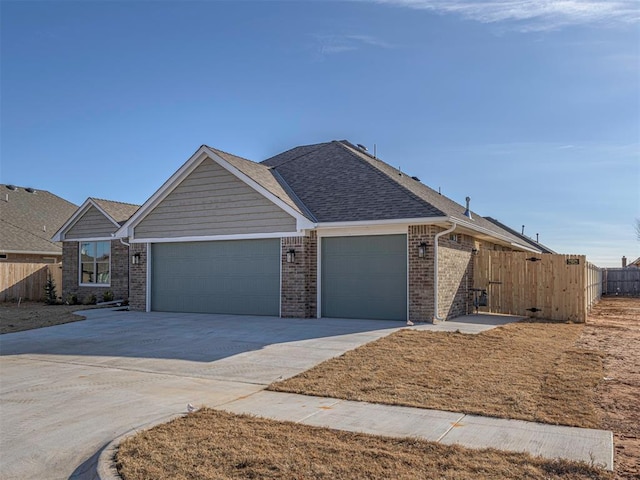 ranch-style house featuring a garage