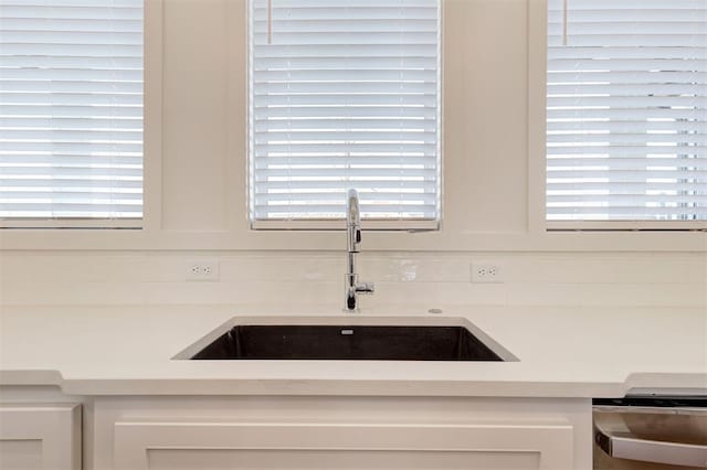 room details with sink and white cabinets