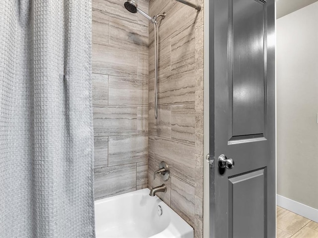 bathroom featuring shower / tub combo and hardwood / wood-style floors