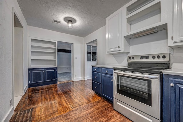 kitchen featuring a textured ceiling, blue cabinets, dark wood-type flooring, white cabinets, and stainless steel range with electric cooktop