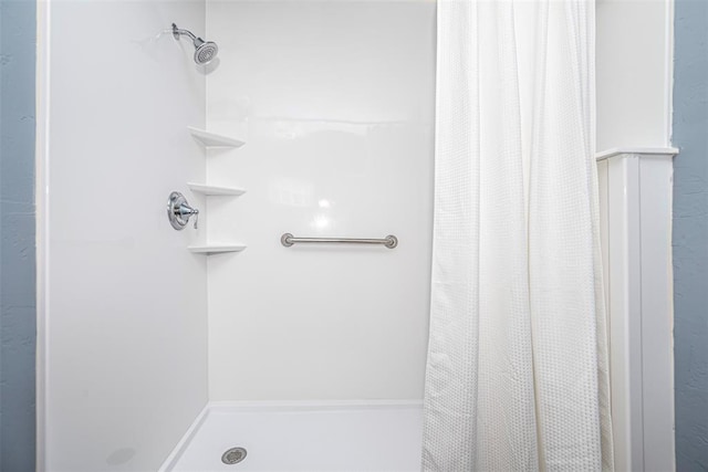 bathroom with walk in shower