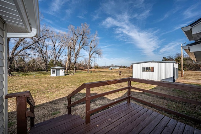 deck with a yard and a storage unit