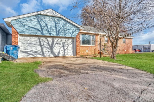 exterior space with a front yard and a garage