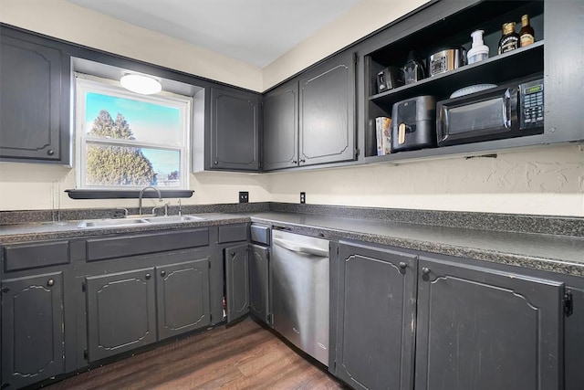 kitchen featuring sink, stainless steel dishwasher, and dark hardwood / wood-style floors