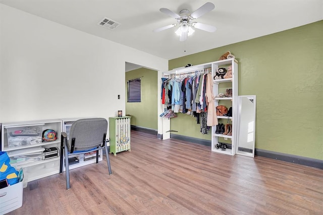 office area featuring hardwood / wood-style flooring and ceiling fan