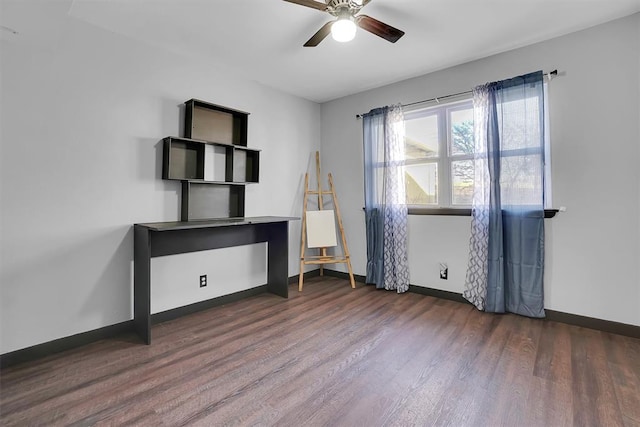 interior space with ceiling fan and dark wood-type flooring