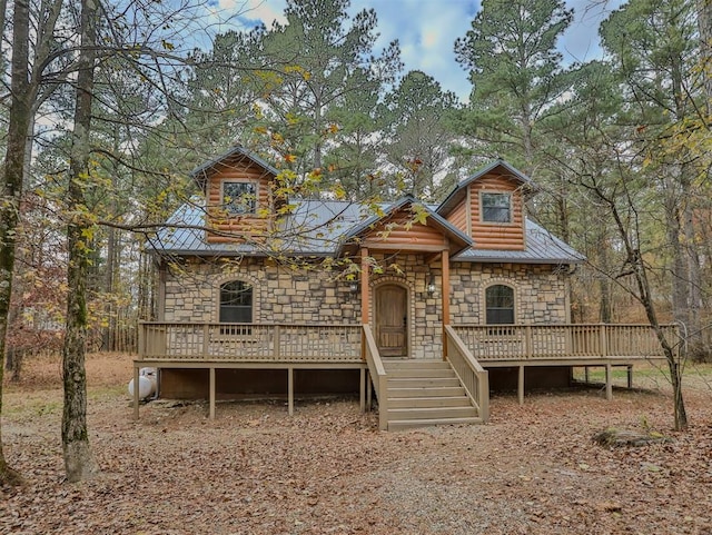 log cabin with a deck