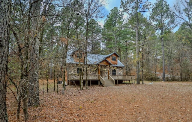 exterior space featuring a wooden deck