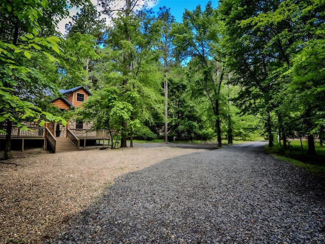 527 High Peak Trl, Broken Bow, OK 74728 - view of yard featuring a wooden deck and stairway