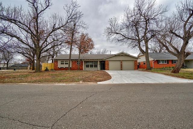 ranch-style home with a garage