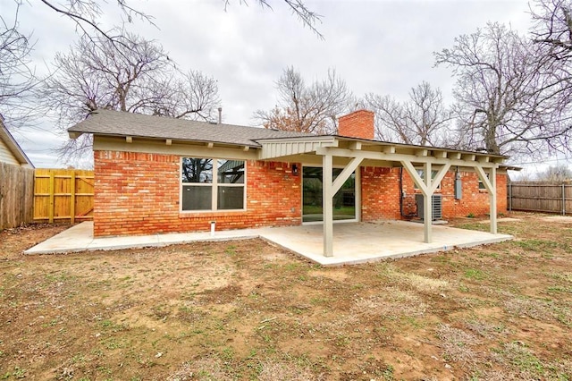 back of property featuring a patio area and central AC unit