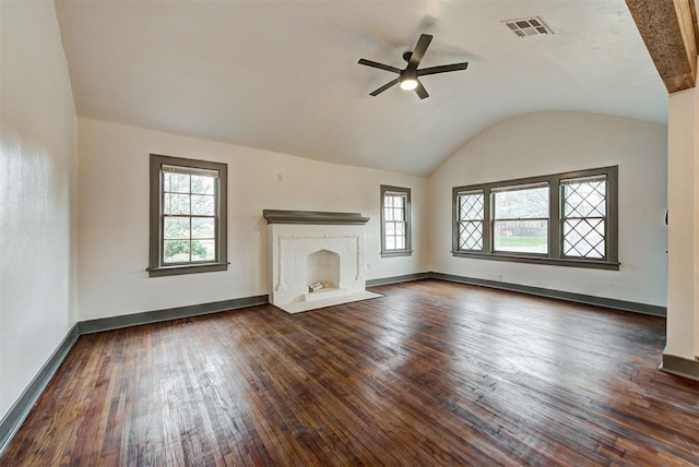 unfurnished living room featuring a fireplace, ceiling fan, dark hardwood / wood-style flooring, and lofted ceiling