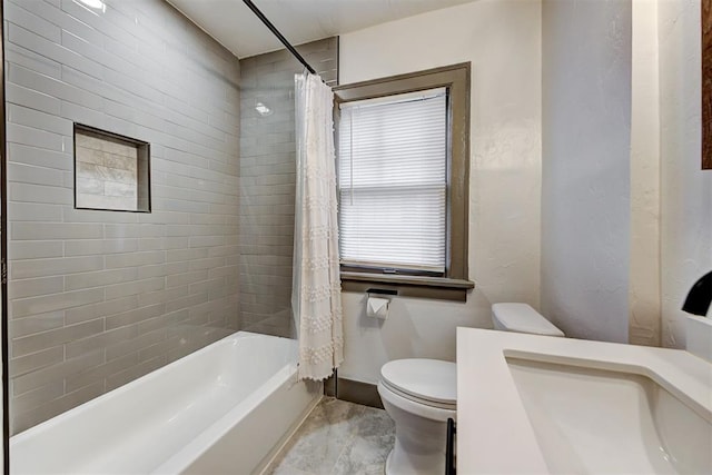 full bathroom with baseboards, toilet, and shower / tub combo with curtain