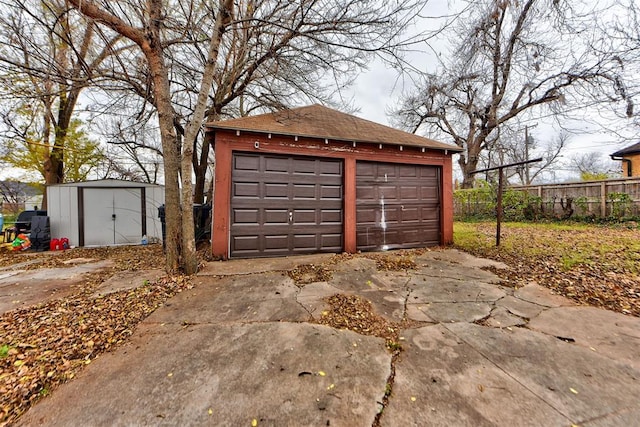 detached garage with fence