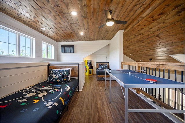 playroom with ceiling fan, wooden walls, wood-type flooring, wooden ceiling, and lofted ceiling