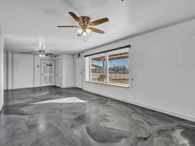 unfurnished room featuring ceiling fan