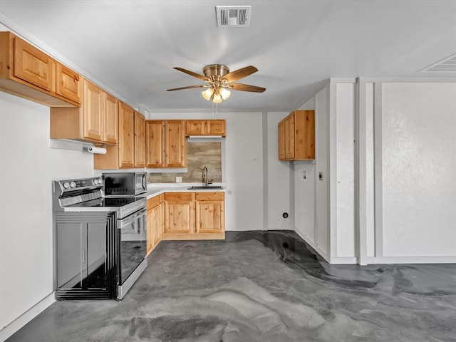 kitchen featuring stainless steel electric range oven, sink, ceiling fan, decorative backsplash, and light brown cabinetry