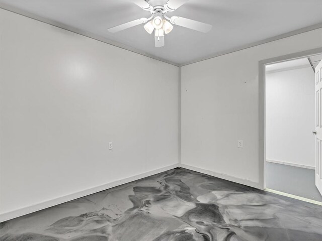 empty room featuring ceiling fan