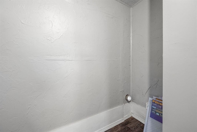 bathroom with wood-type flooring