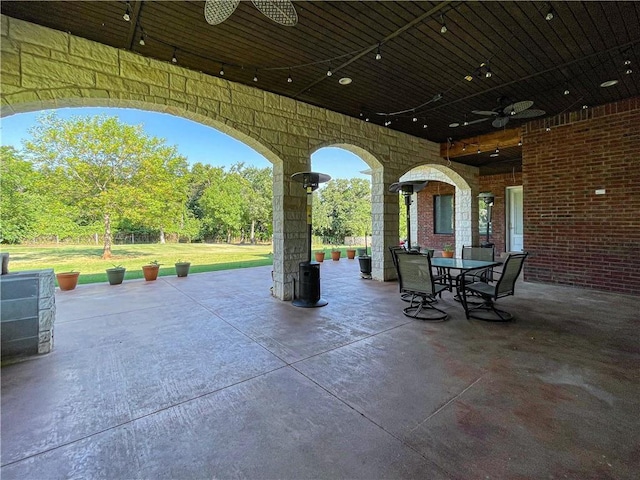 view of patio / terrace featuring ceiling fan