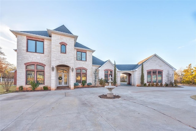 french country style house with french doors