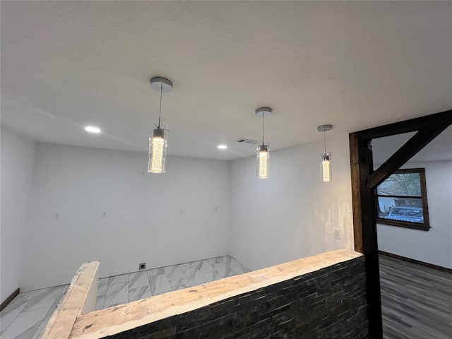 bar featuring pendant lighting