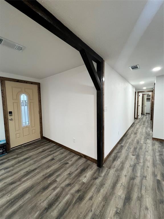 entrance foyer with hardwood / wood-style floors