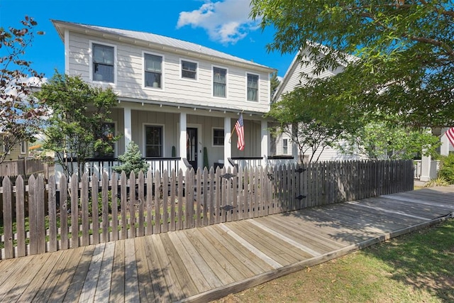 view of front of house featuring a wooden deck