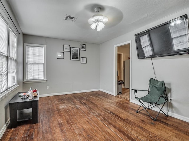 unfurnished room featuring wood-type flooring and ceiling fan