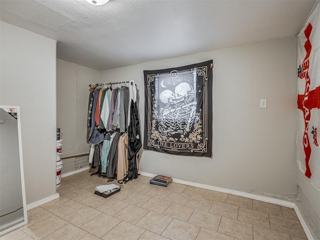 interior space with a textured ceiling