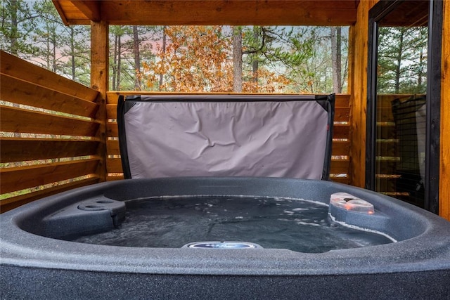 view of patio / terrace with a hot tub