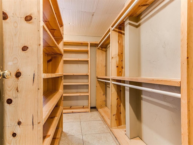 walk in closet featuring light tile patterned floors